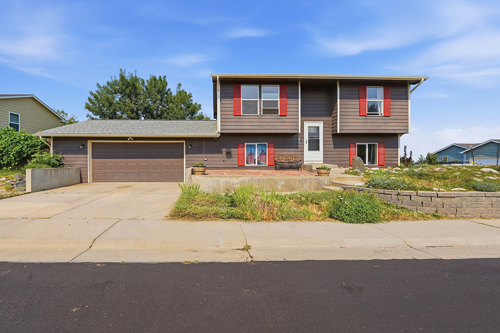 Front at 513 Sundance Circle, Dacono, CO 80514, listed by Eric Morris