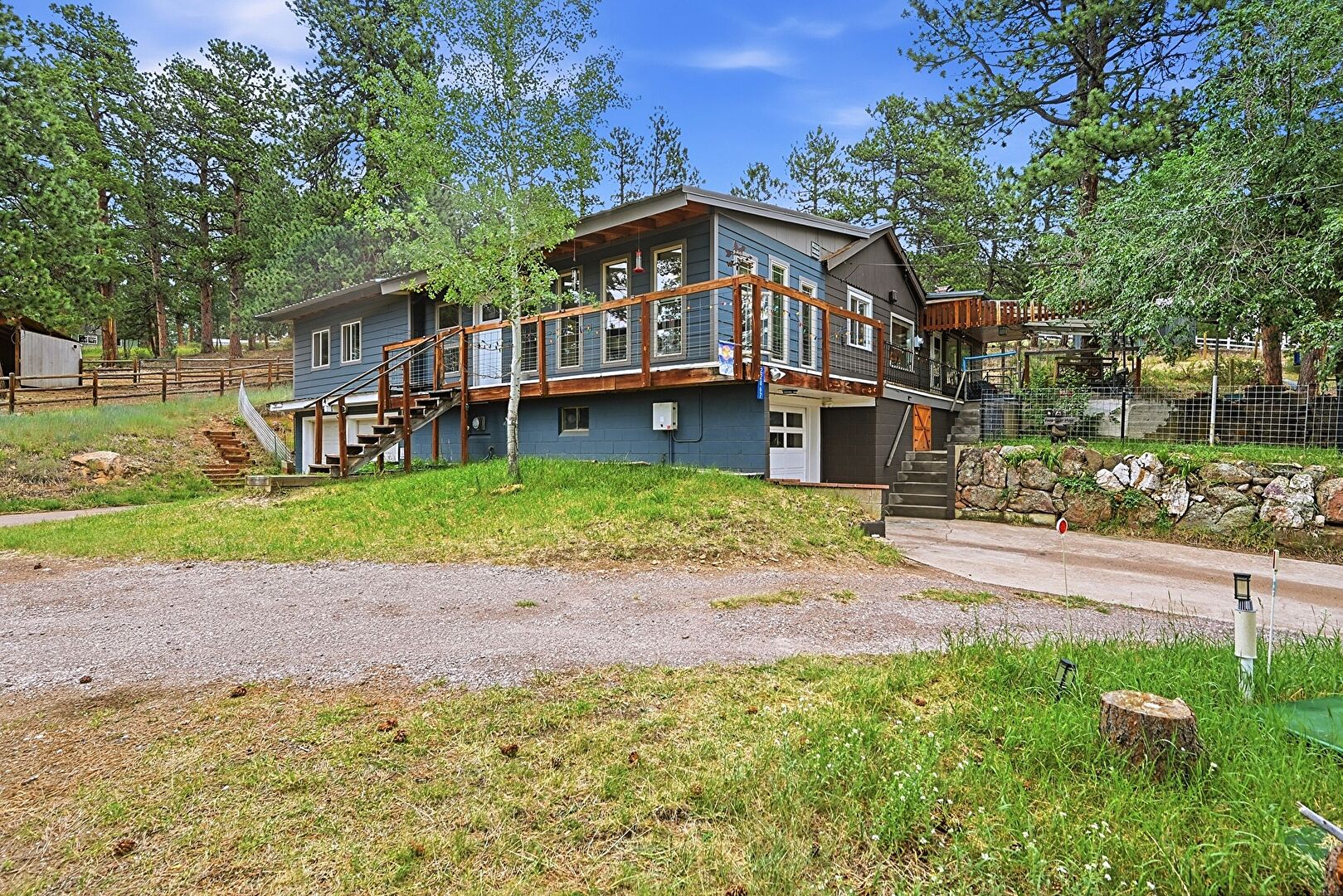 Front at 22867 Pawnee Road, Indian Hills, CO 80454, listed by Amy Freeman, MLS ID: 8854639