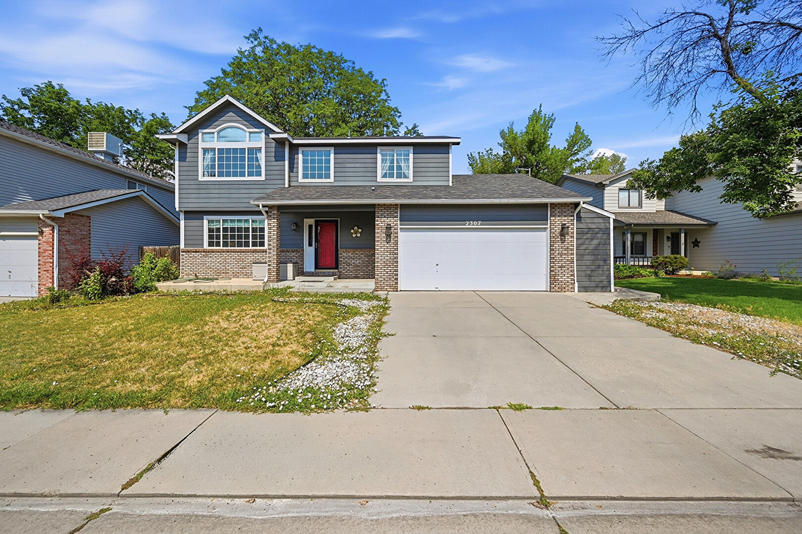 Front at 2307 Frontier Street, Longmont, CO 80501, listed by LIsa Yoshimura