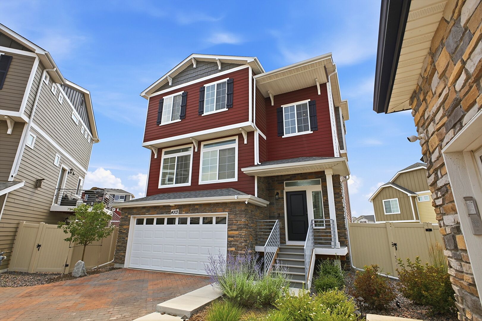Front at 4003 North Quatar Court, Aurora, CO 80019, listed by Mike & Ed Hardey