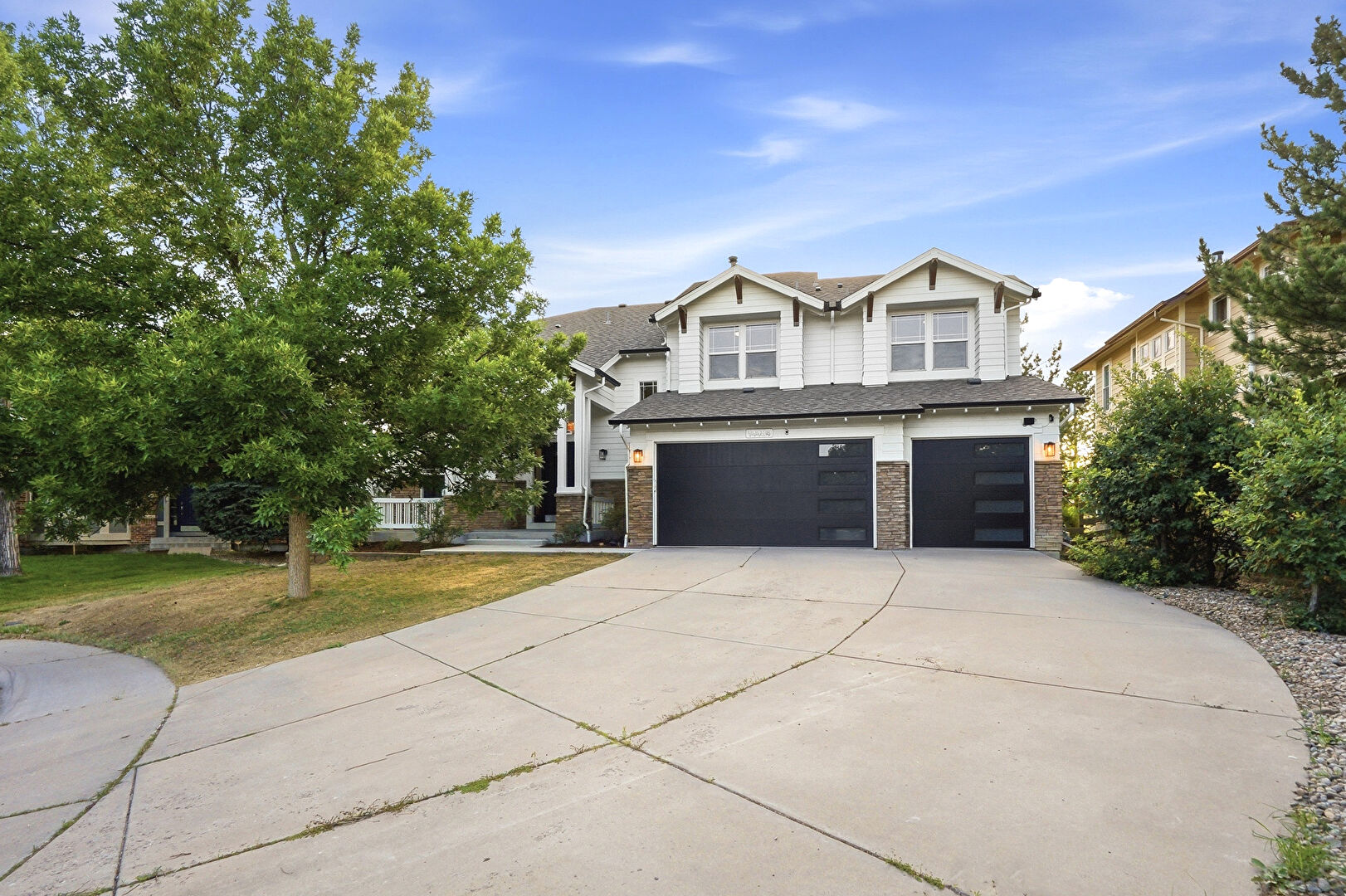 Front at 14484 West Dartmouth Avenue, Lakewood, CO 80228, listed by Brianna Steffan