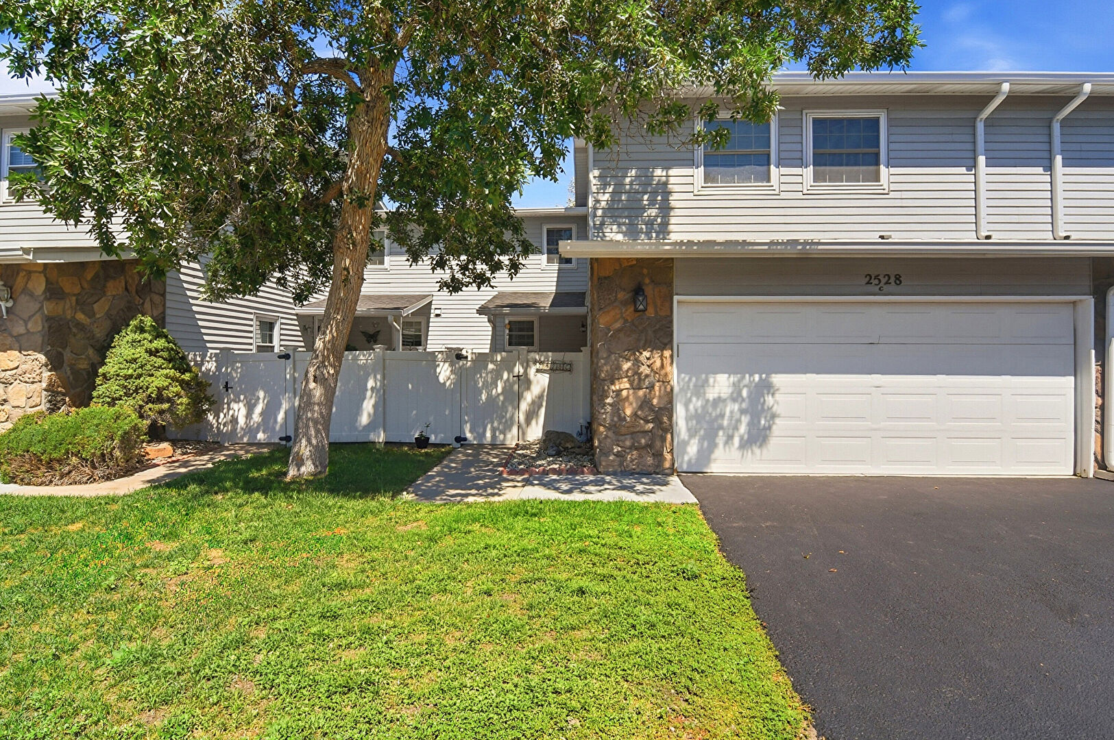 Front at 2528 S Vaughn Way C, Aurora, CO 80014, listed by Jane Pearson