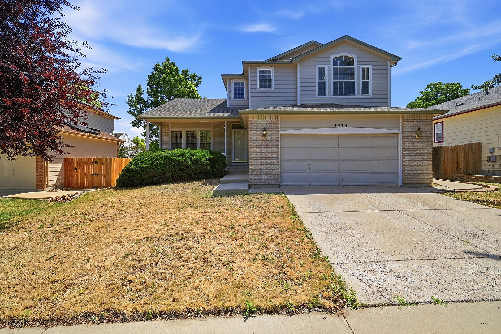 Front at 4934 s Danube Street, Aurora, CO 80015, listed by Jessica Kuhn