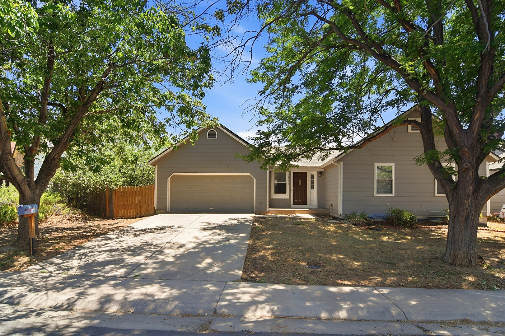 Front at 16136 E Exposition Dr, Aurora, CO 80013, listed by Jessica Kuhn
