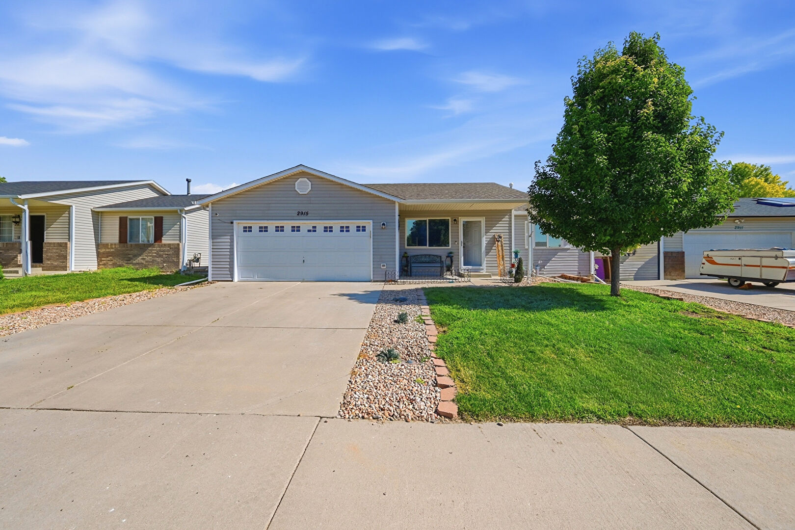 Front at 2915 Ptarmigan Drive, Evans, CO 80620, listed by Brad Inhulsen