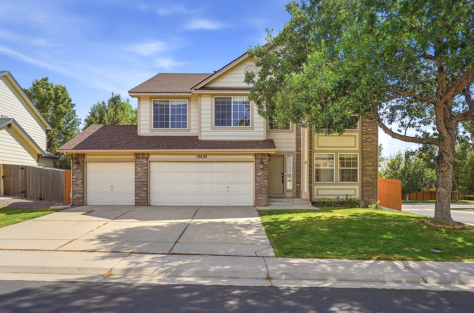 Front at 18820 East Progress Avenue, Centennial, CO 80015, listed by Greg Livingston