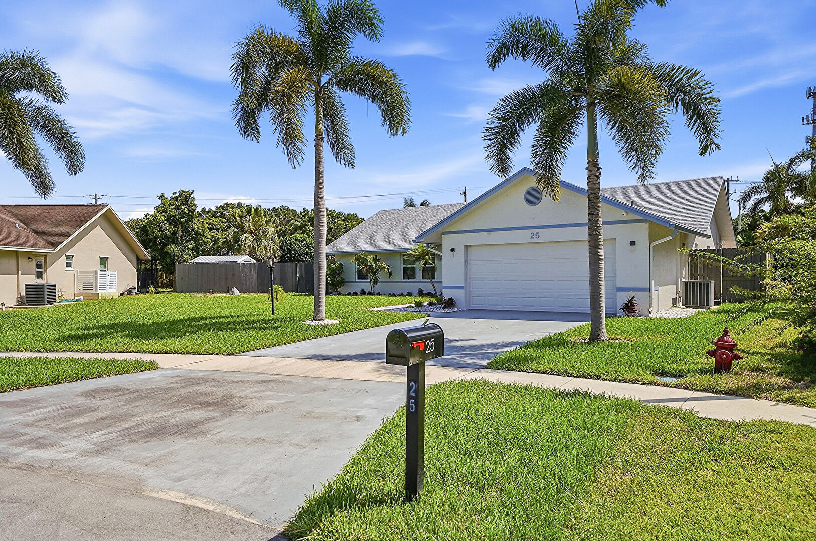 Front at 25 Cedar Circle, Boynton, FL 33436, listed by Gurkiran (Kiran) Singh