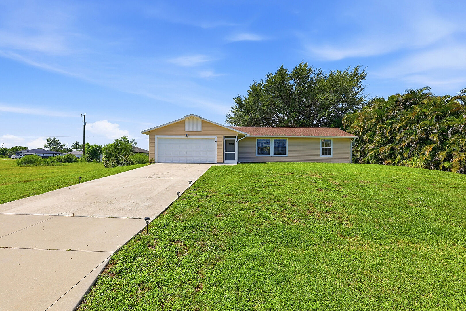 Front at 302 Northwest 5th Terrace, Cape Coral, FL 33993, listed by Connie Dang