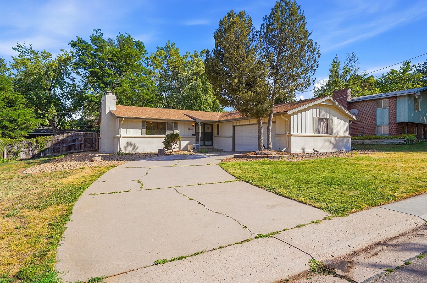 Front at 3260 East Maplewood Avenue, Centennial, CO 80121, listed by Taylor Haas