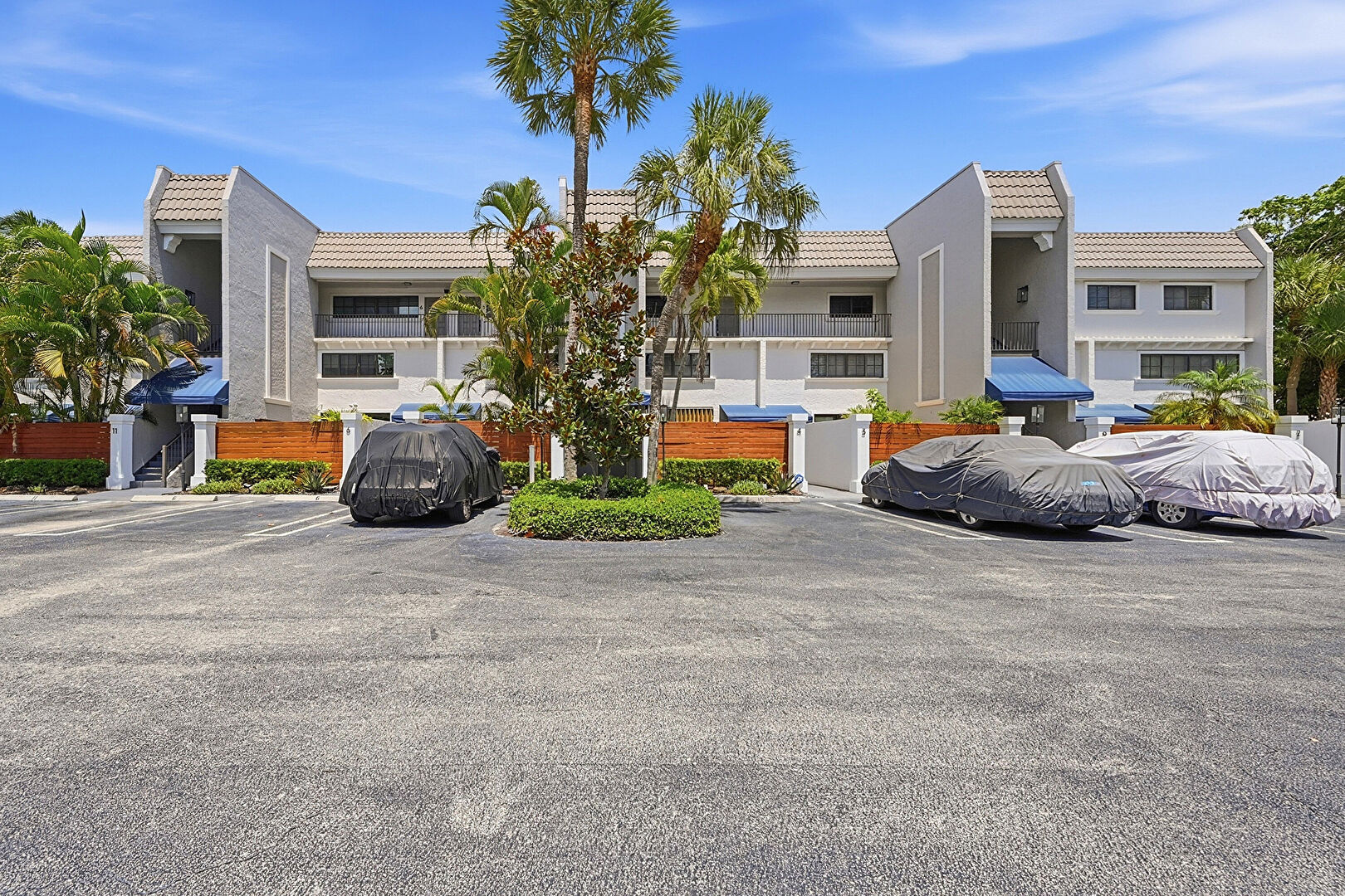 Front at 801 Palm Trail, APT #10, Delray Beach, FL 33483, listed by Michael Clemente