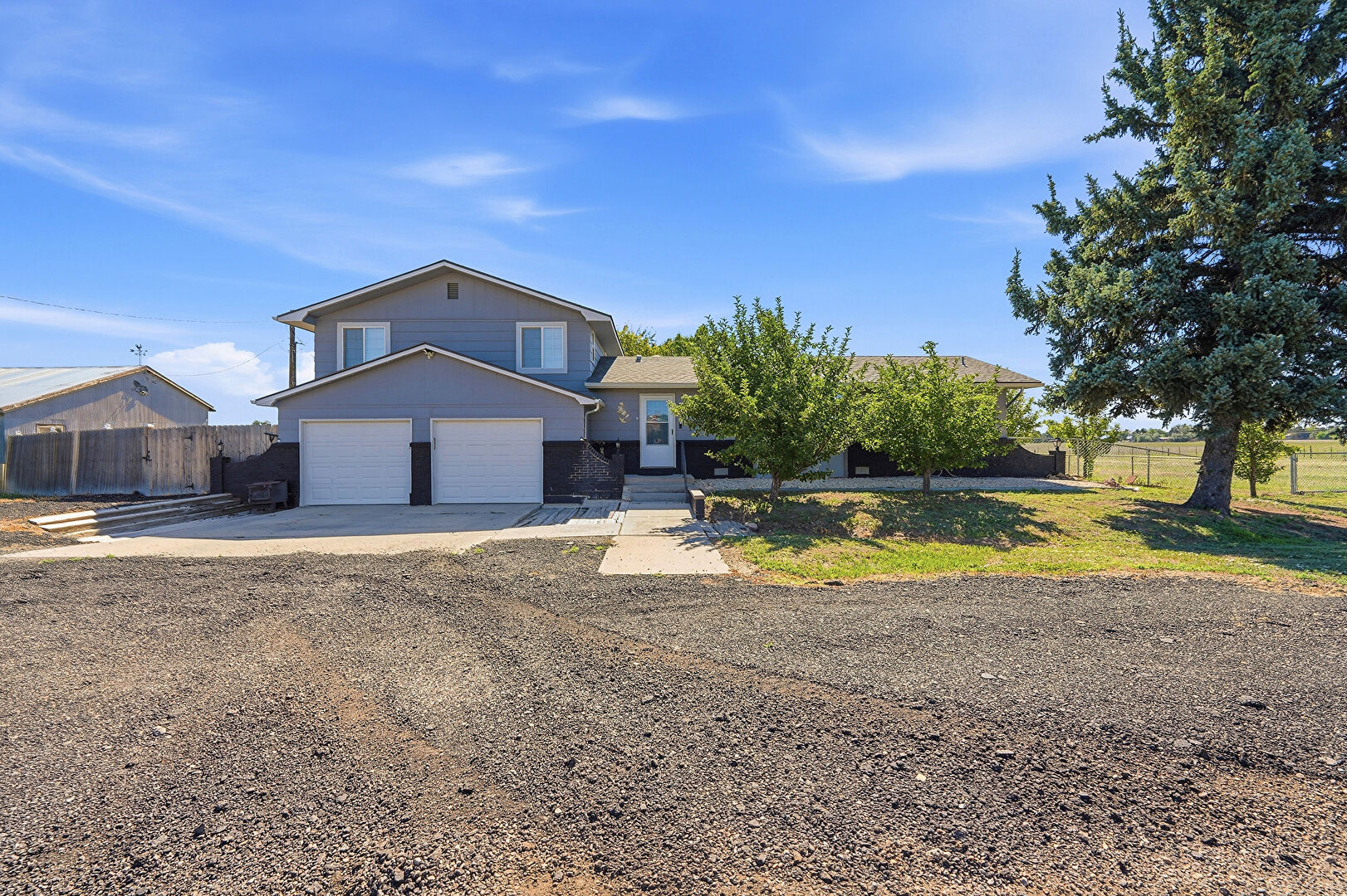 Front at 12822 North 95th Street, Longmont, CO 80504, listed by Magali Fredrick