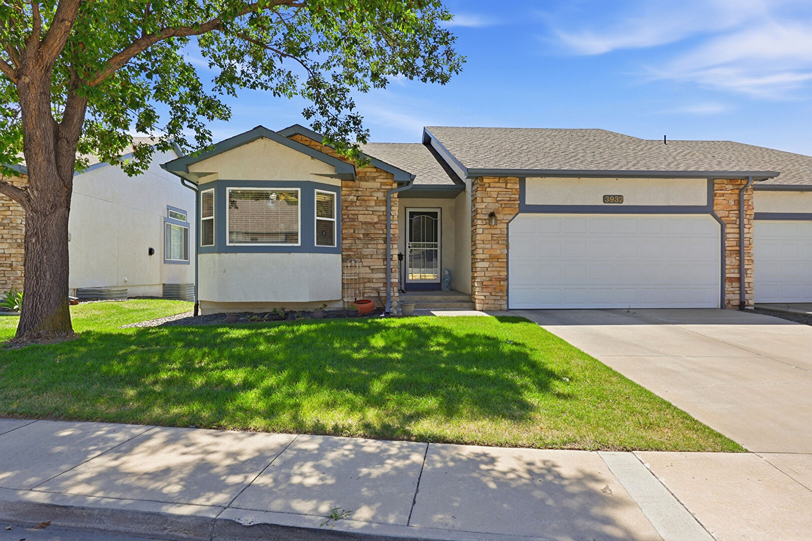 Front at 3932 Coral Point, Colorado Springs, CO 80917, listed by Krisanne Young