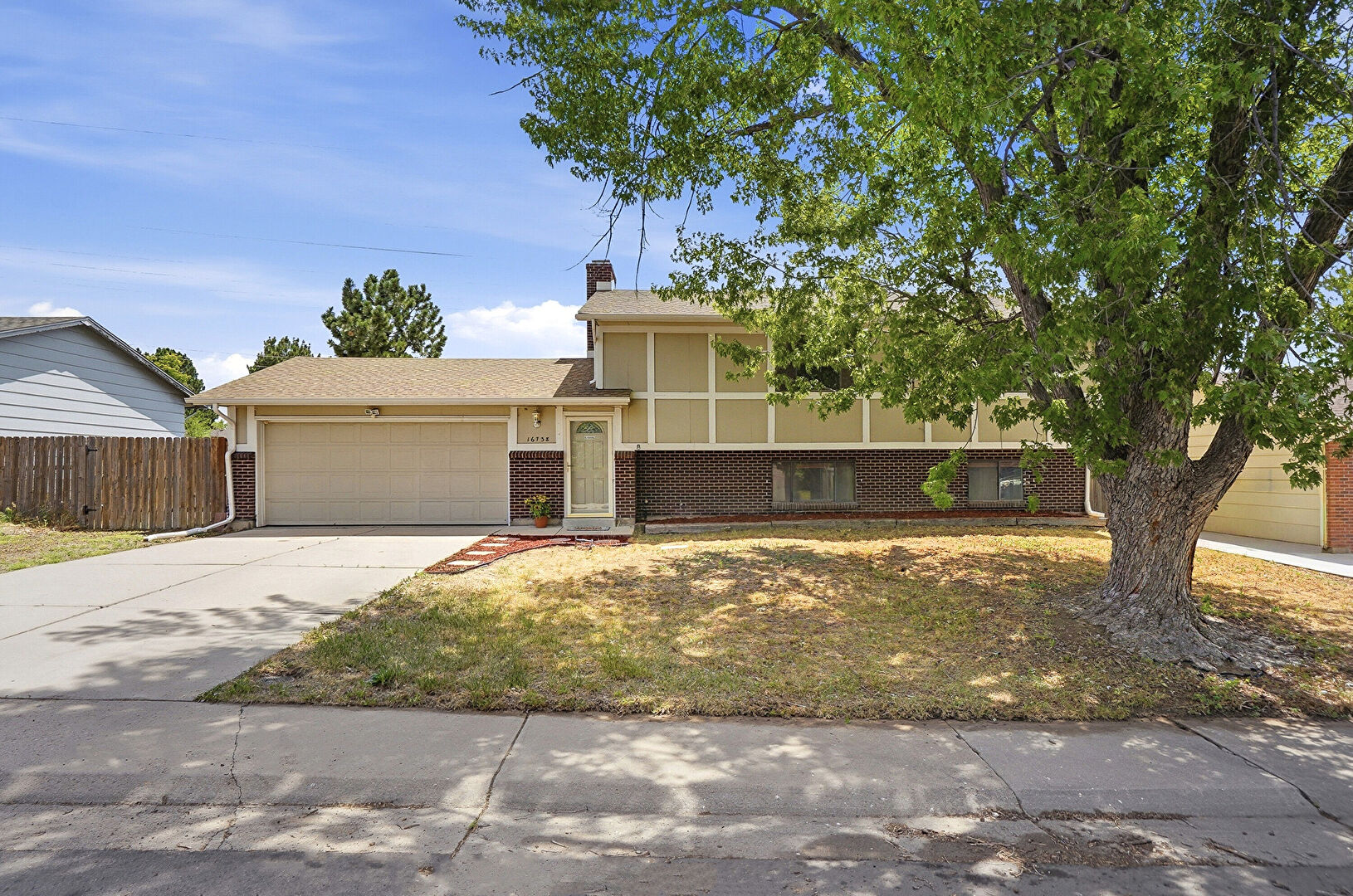 Front at 16738 East Bails Place, Aurora, CO 80017, listed by Tim Hoyman