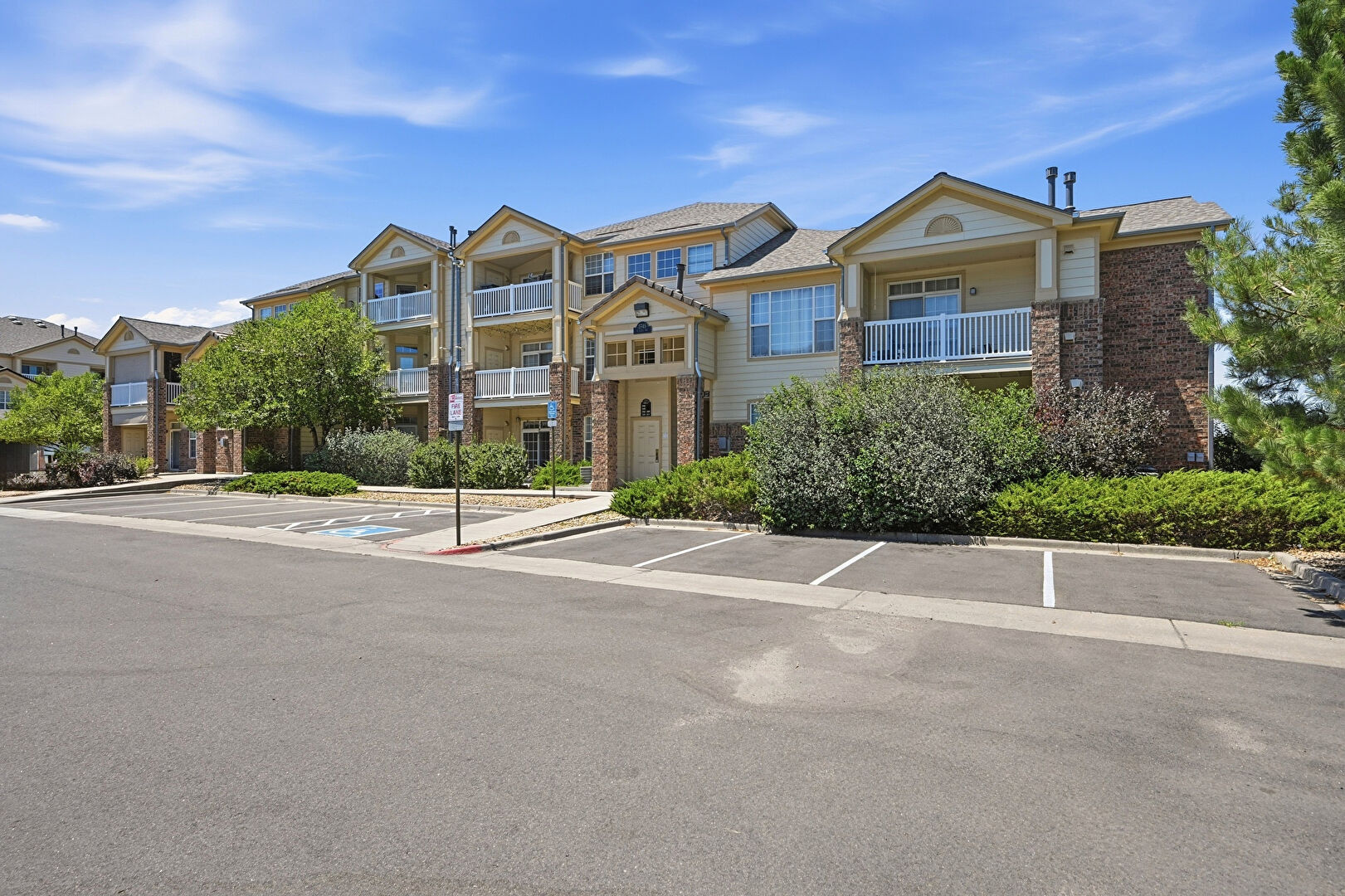Front of Structure at 5745 North Genoa Way #13-303, Aurora, CO 80019, listed by Taylor Haas