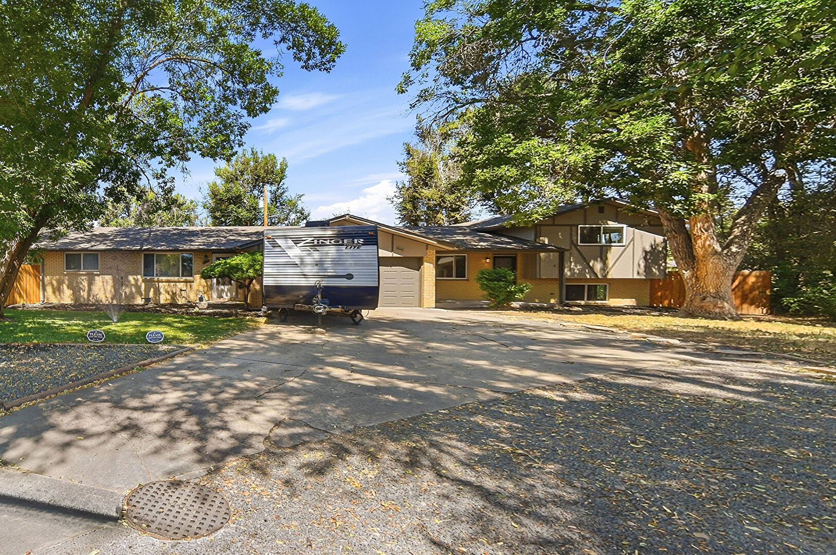 Front at 4865 Flower Court, 4863 Flower Court, Arvada, CO 80002, listed by Rob Martin