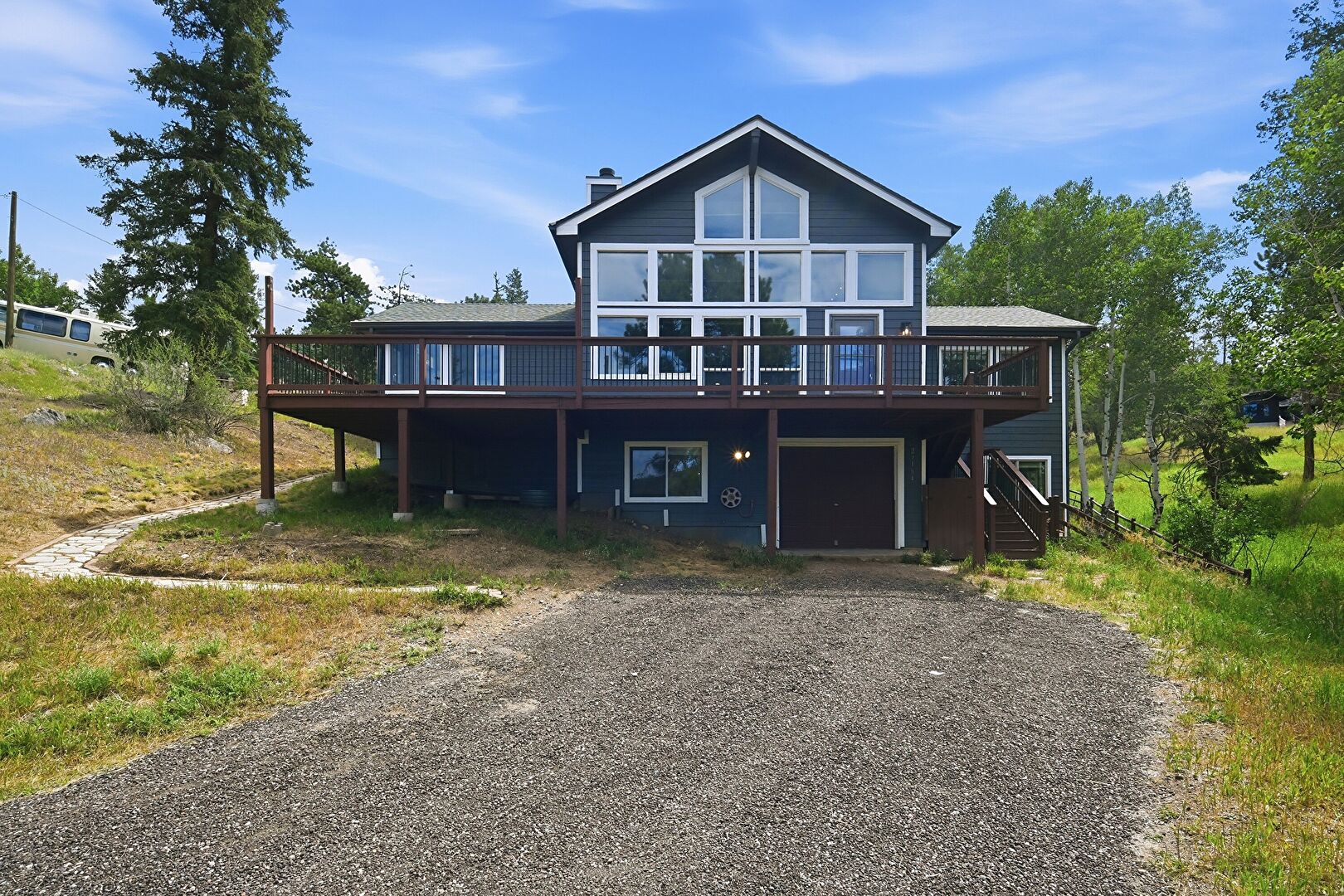 Front at 27164 Thimbleberry LN, Evergreen, CO 80439, listed by Katie Metzger