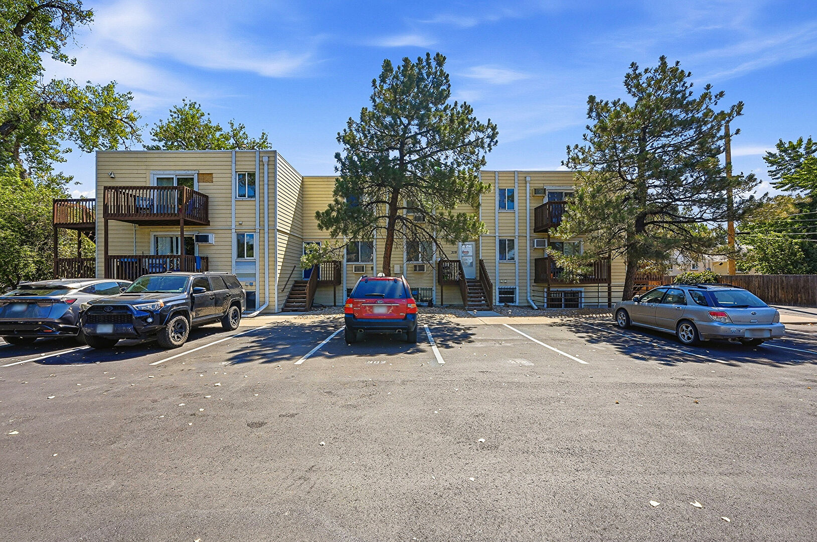 Front yard at 9240 West 49th Avenue, Unit #308, Wheat Ridge, CO 80033, listed by Kimberly Burns