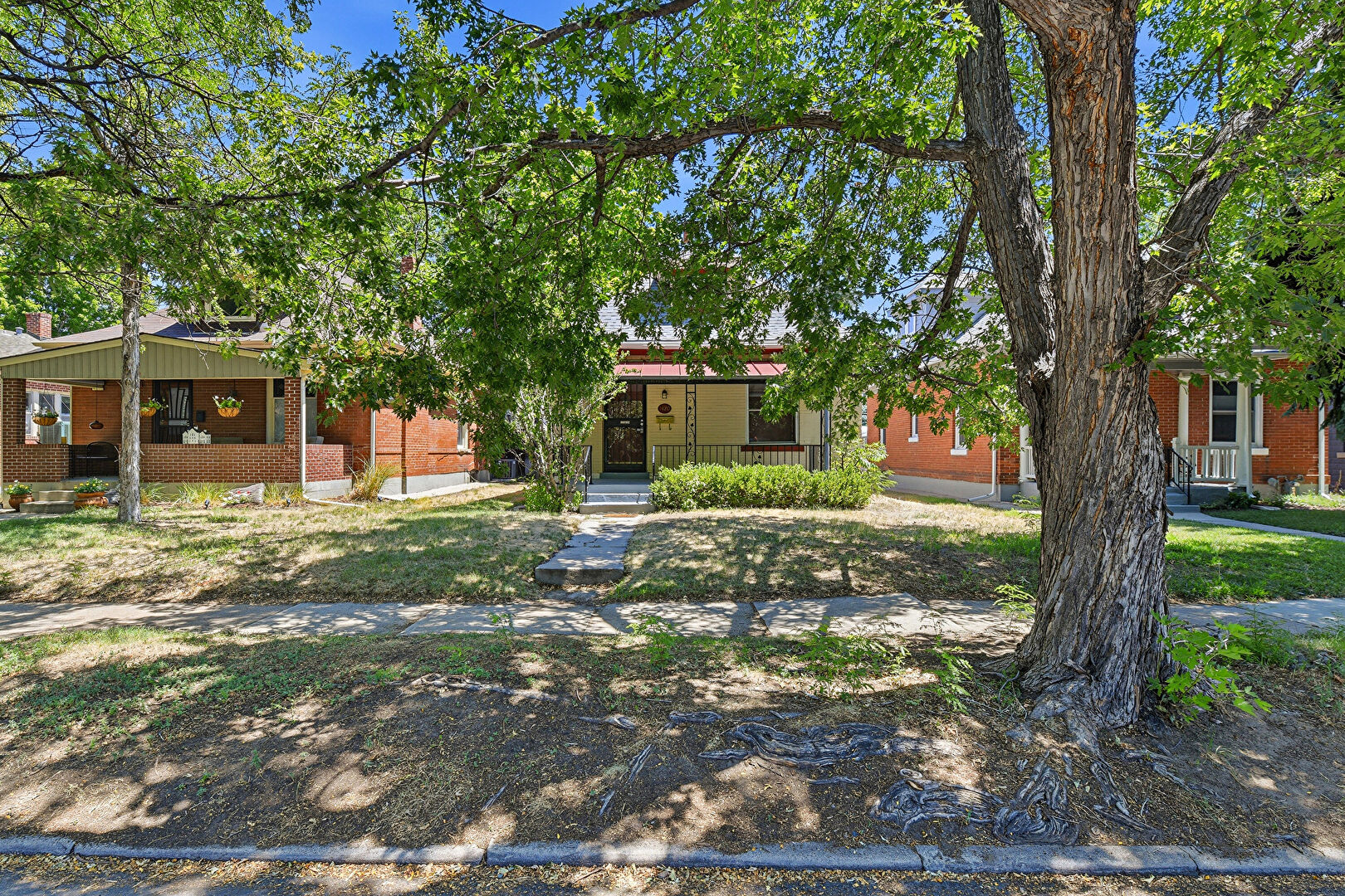 Front at 1420 South Washington Street, Denver, CO 80210, listed by Taylor Haas