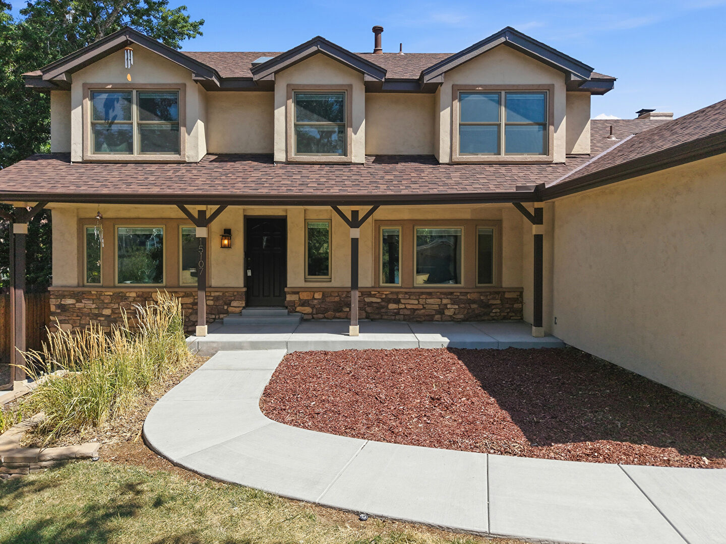 Front at 15107 East Grand Avenue, Aurora, CO 80015, listed by Erin Mehojah