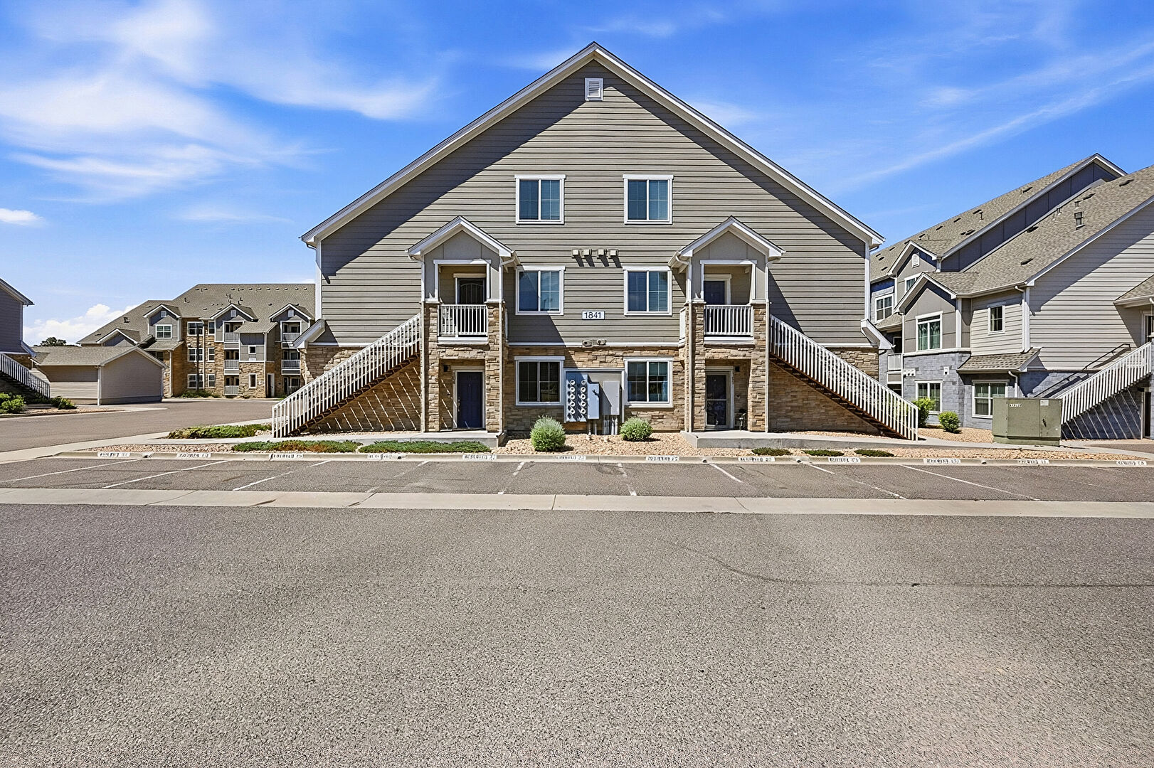 Front of Structure at 1841 South Dunkirk Street, Unit 106, Aurora, CO 80017, listed by Idalia Padilla