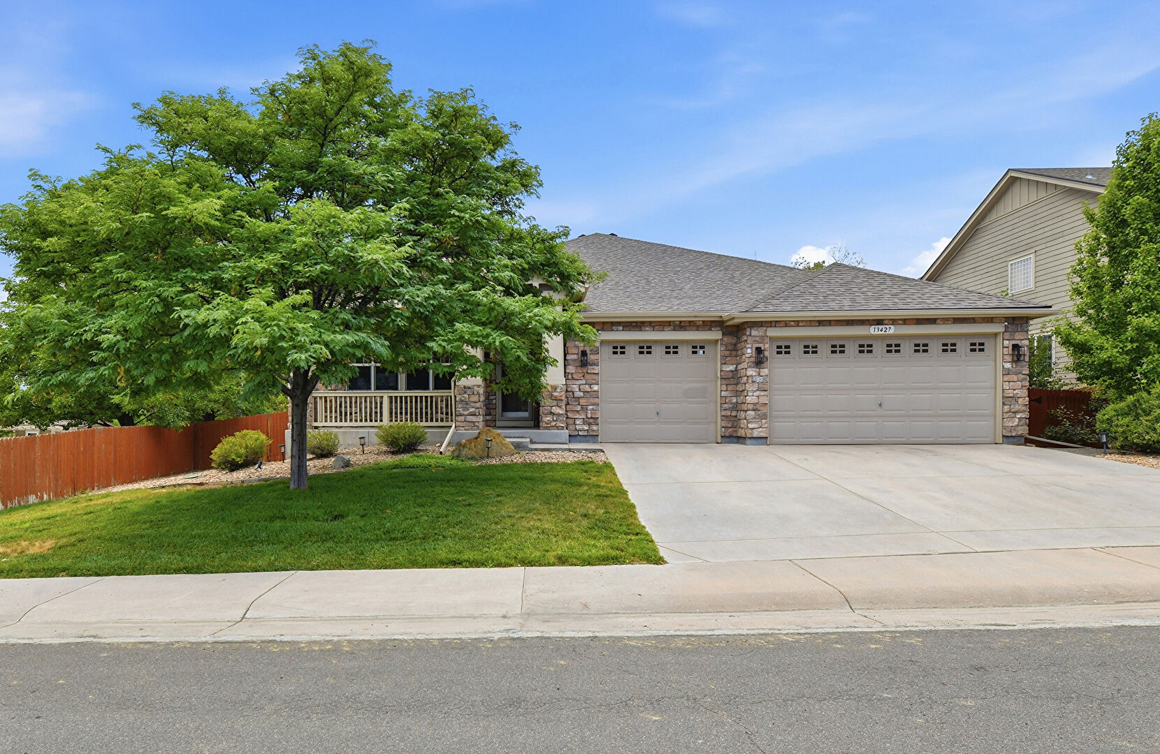 Front at 13427 Locust Street, Thornton, CO 80602, listed by Todd Welch