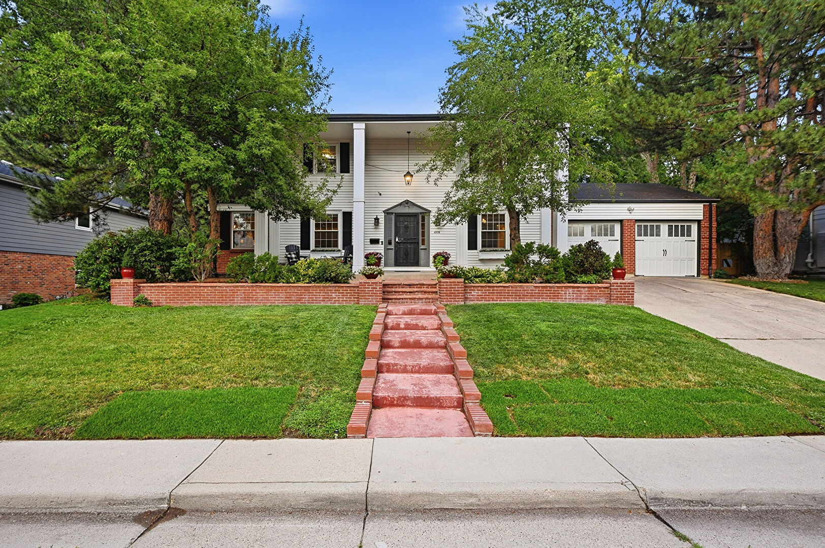 Front at 6838 South Elizabeth Street, Centennial, CO 80122, listed by Jim Rauh