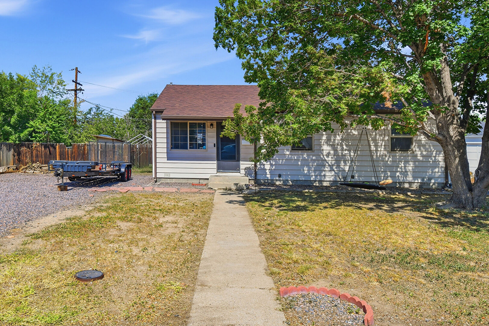 Front at 9410 High Street, Thornton, CO 80229, listed by Jasmine Garcia