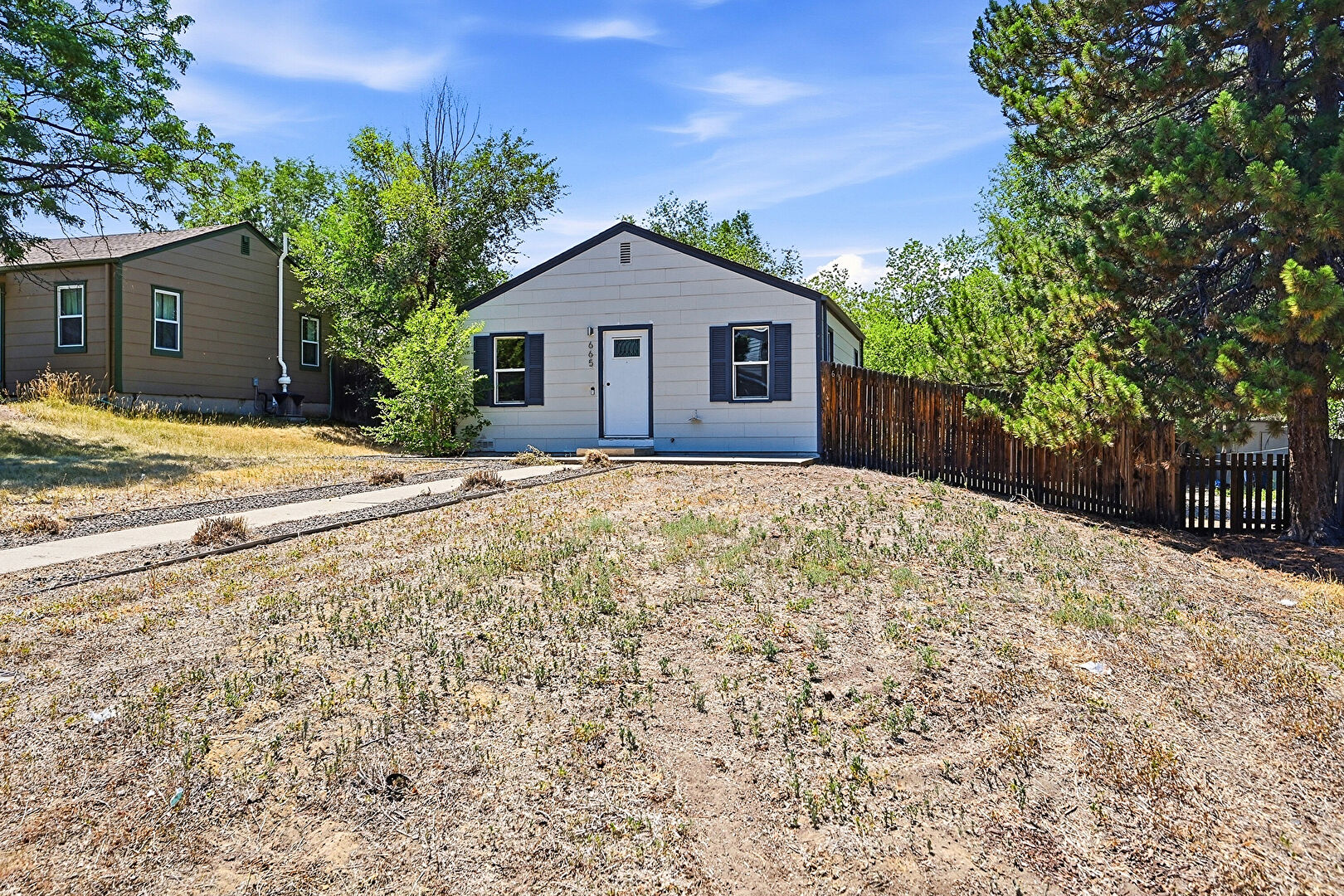 Front at 665 Tennyson Street, Denver, CO 80204, listed by Taylor Haas