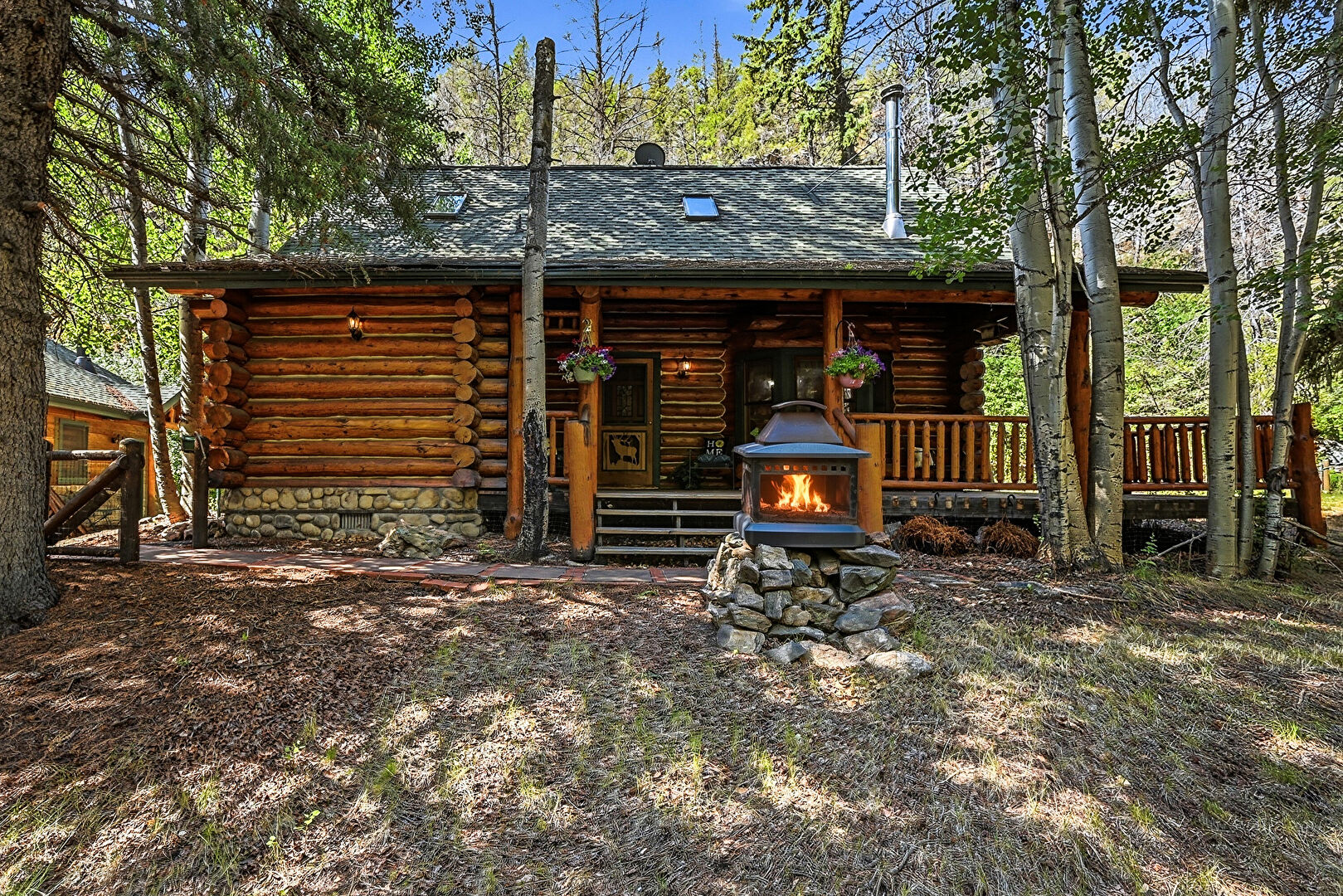 Front at 14573 South Elk Creek Road, Pine, CO 80470, listed by Jodi Dolph