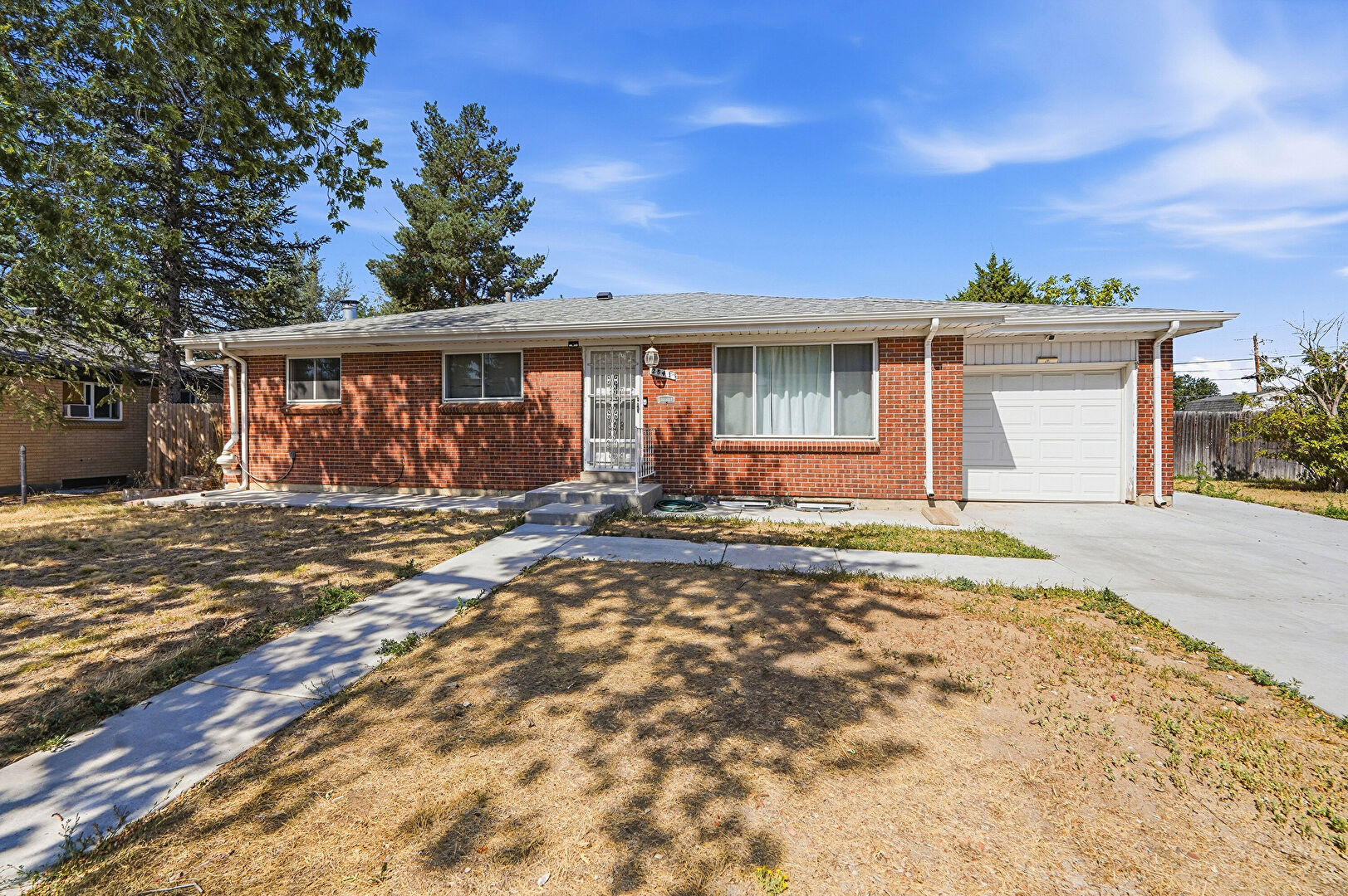 Front at 2541 Billings Street, Aurora, CO 80011, listed by John Yeh