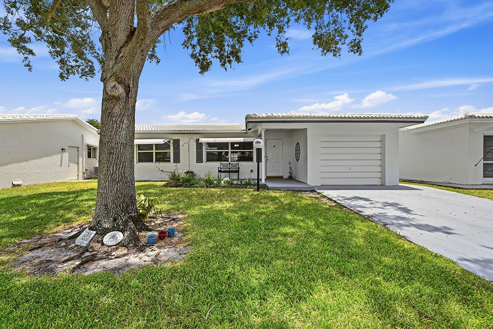 Front at 8960 NW 12th Place, Plantation, FL 33322, listed by Laura Sanders