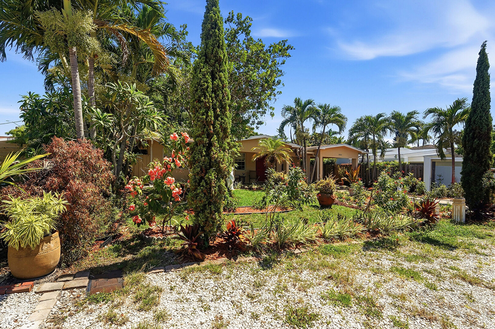 Front yard at 1412 Northeast 14th Place, Fort Lauderdale, FL 33304, listed by Anne Marie Yibirin
