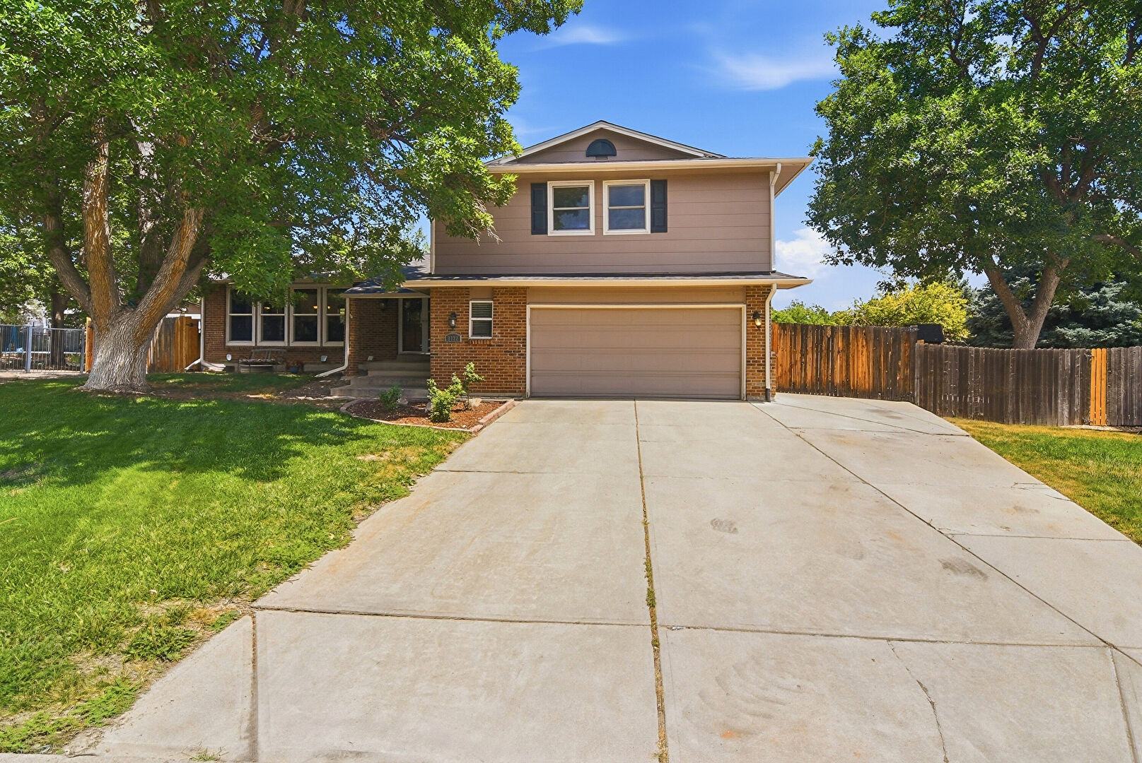 Front at 7772 South Marshall Court, Littleton, CO 80128, listed by Tim Hoyman