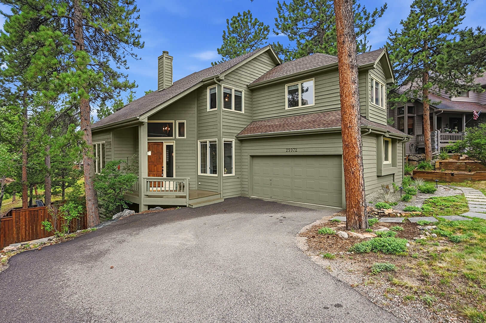 Front at 29972 Troutdale Ridge Road, Evergreen, CO 80439, listed by Kimberly Burns