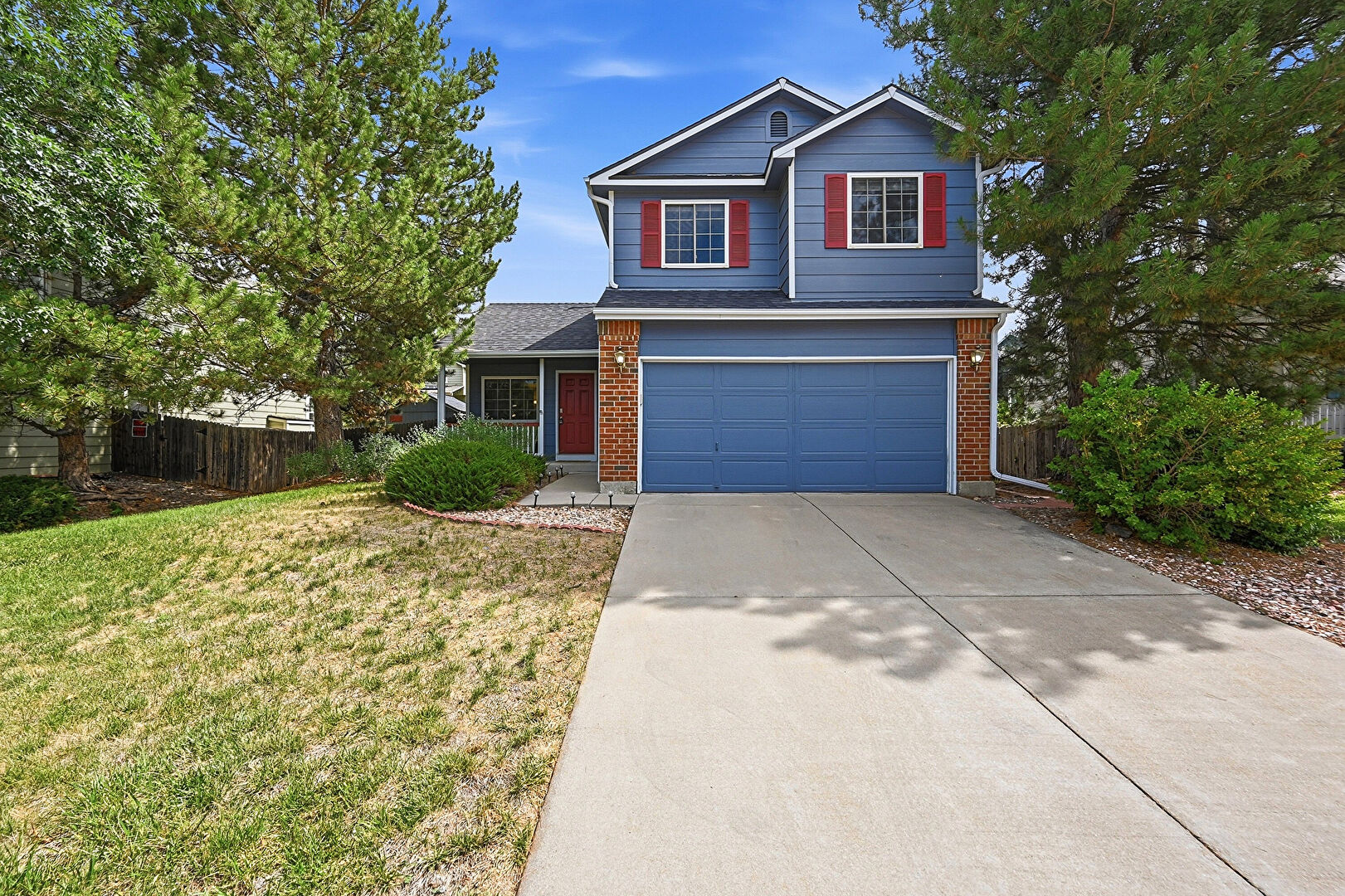 Front at 19803 East Stanford Drive, Centennial, CO 80015, listed by Scott Davidson