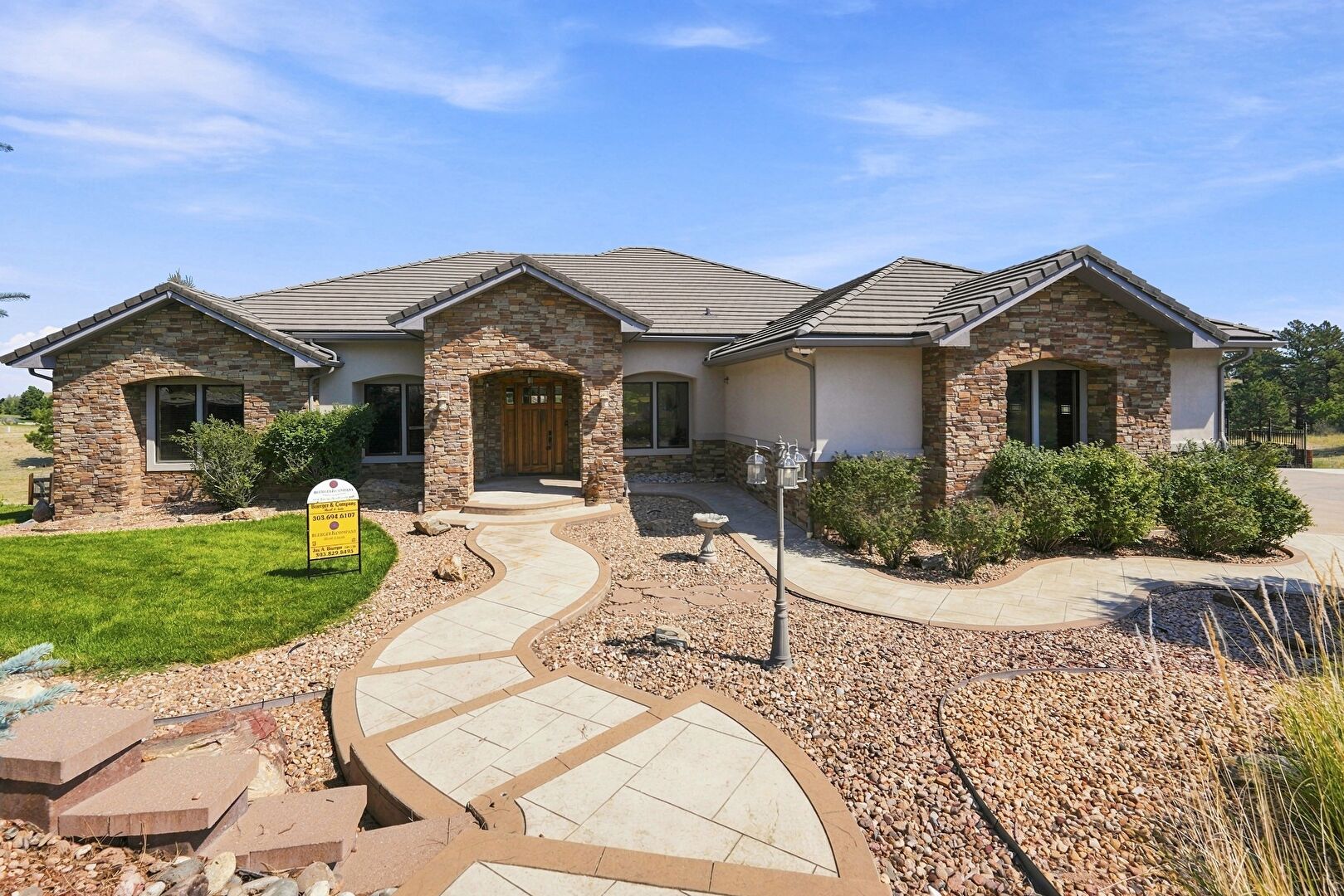 Front at 9753 Falcon Roost Point, Parker, CO 80138-7871, listed by Jay A. Buerger