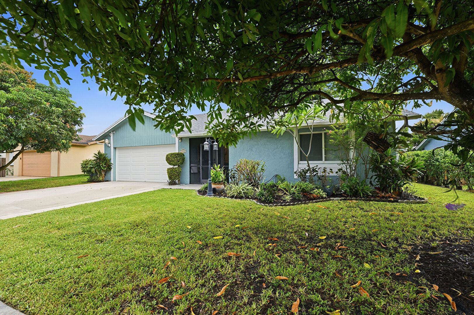 Front at 23265 Southwest 61st Avenue, Boca Raton, FL 33428, listed by Claudia garcia