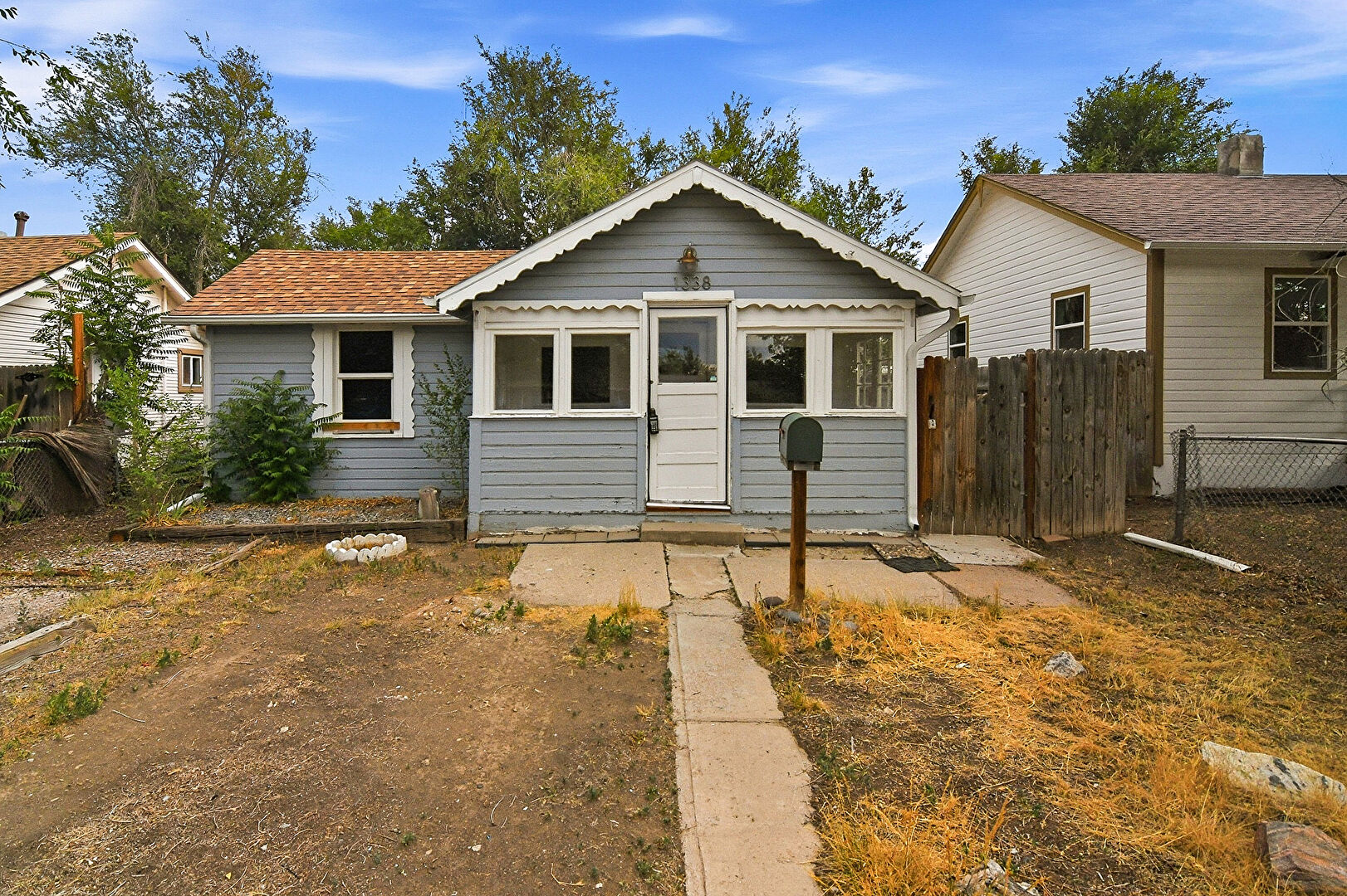 Front at 1338 Iola Street, Aurora, CO 80010, listed by Taylor Haas