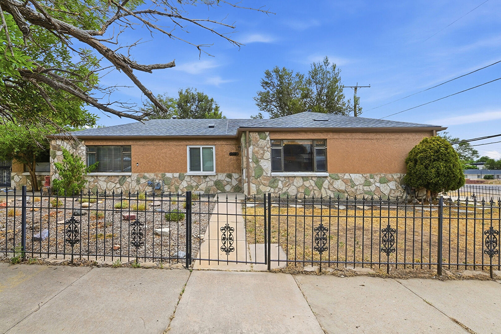 Front at 3259 Adams Street, Denver, CO 80205, listed by Taylor Haas