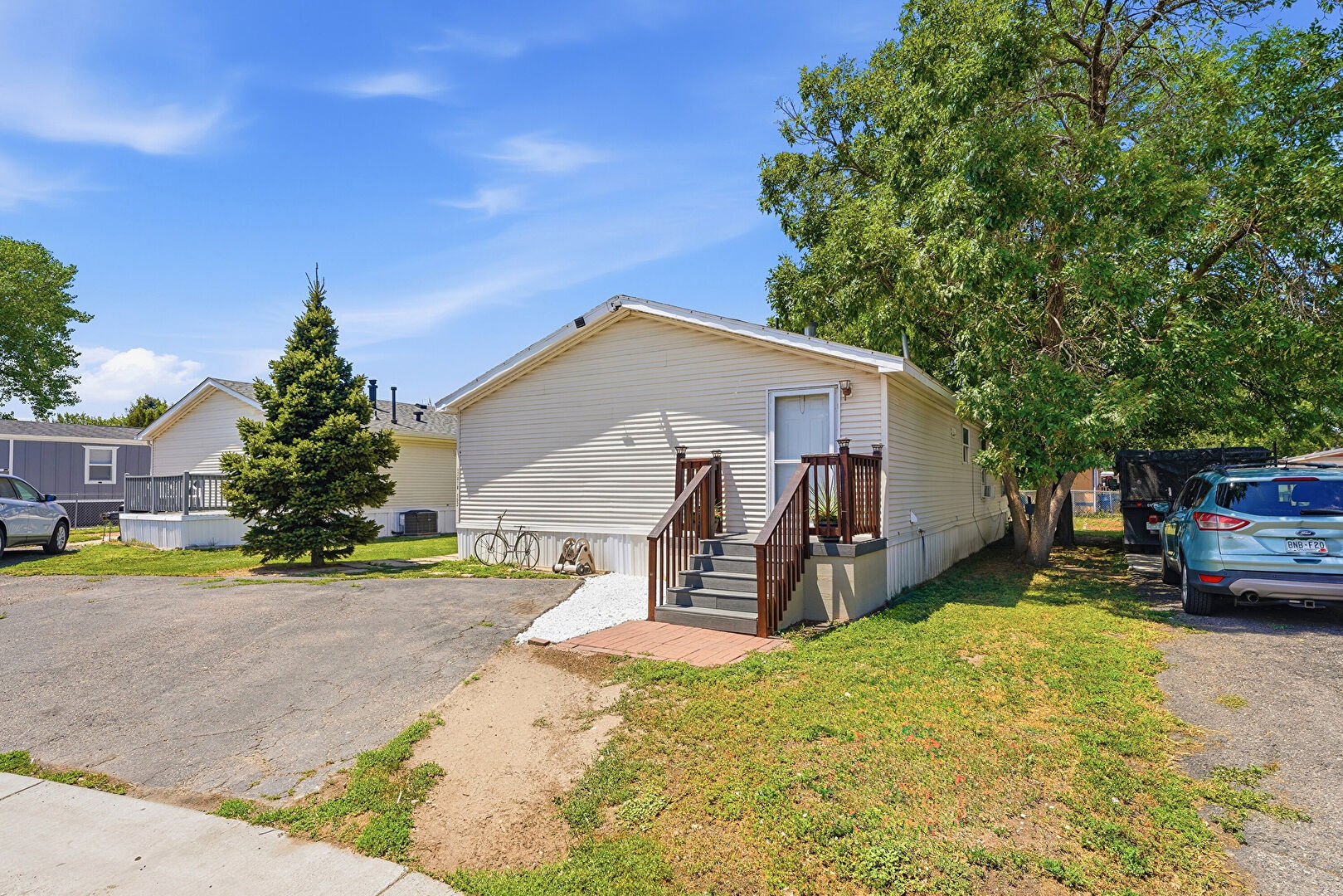Front at 17418 East Coolidge Place, Aurora, CO 80011, listed by Kristen White