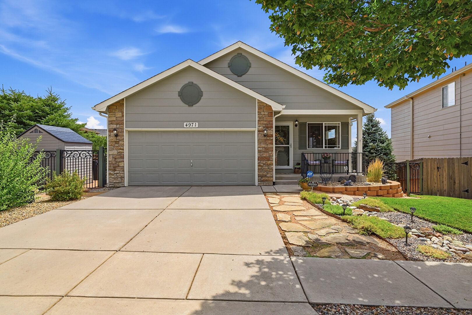 Front at 4971 Sand Ripples Lane, Colorado Springs, CO 80922, listed by Jeni VanOrnum