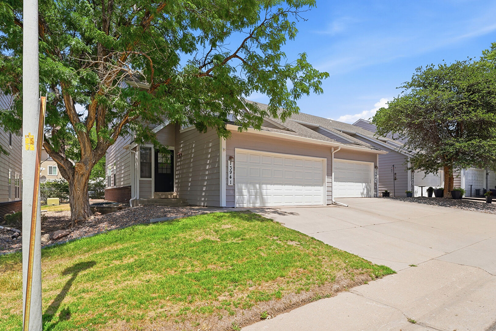 Front at 13941 East Oxford Pl., Aurora, CO 80014, listed by Ted Peterson Care Real Estate