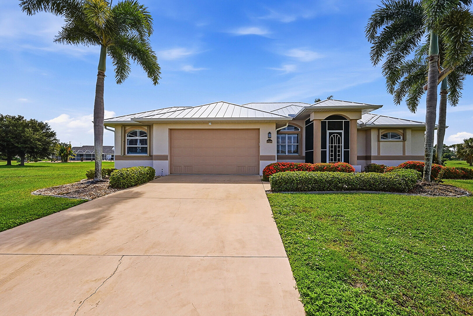 Front yard at 17400 Huancay Lane, Punta Gorda, FL 33955, listed by Patricia Ewashko