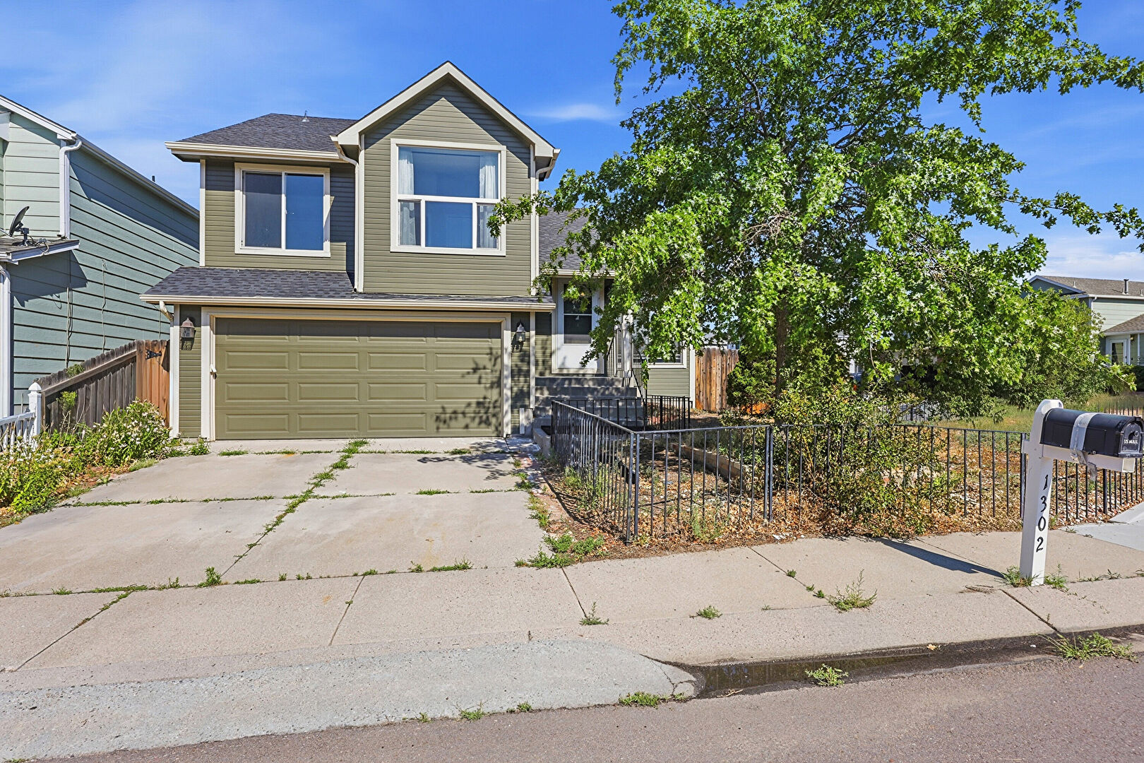 Front at 1302 Ride Lane, Colorado Springs, CO 80916, listed by Taylor Haas