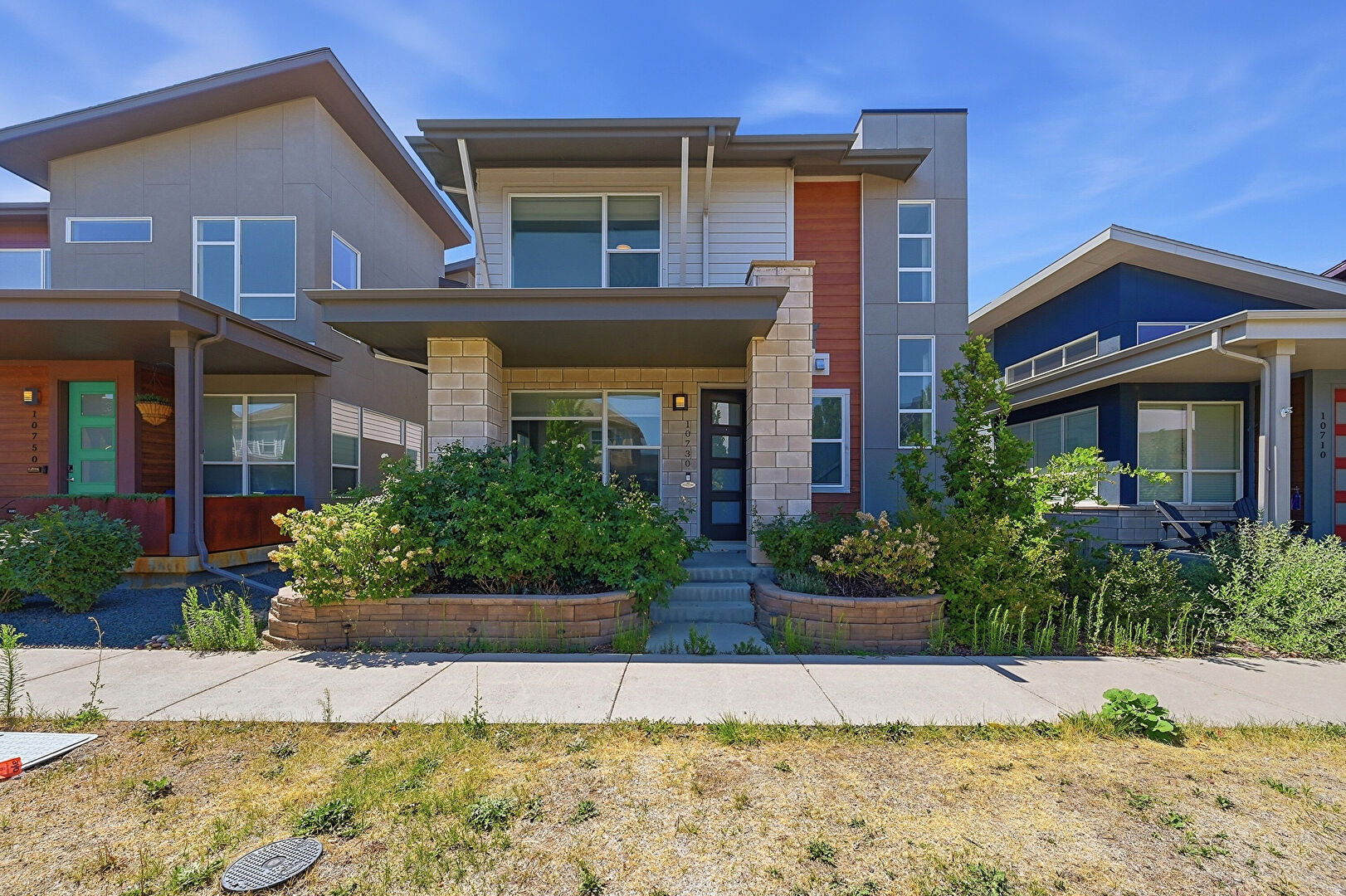 Front at 10730 E 26th Ave, Aurora, CO 80010, listed by Lauren Weiss