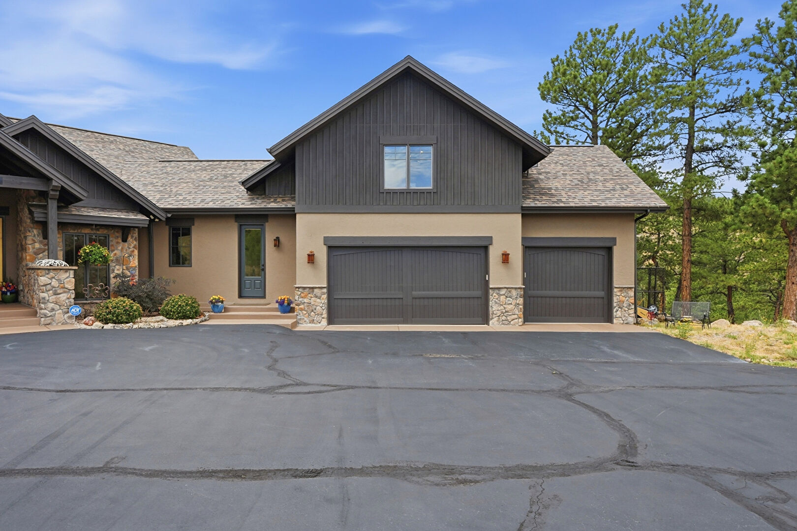 Front at 15100 Quandary Peak Trail, Pine, CO 80470, listed by Kelly Dolph