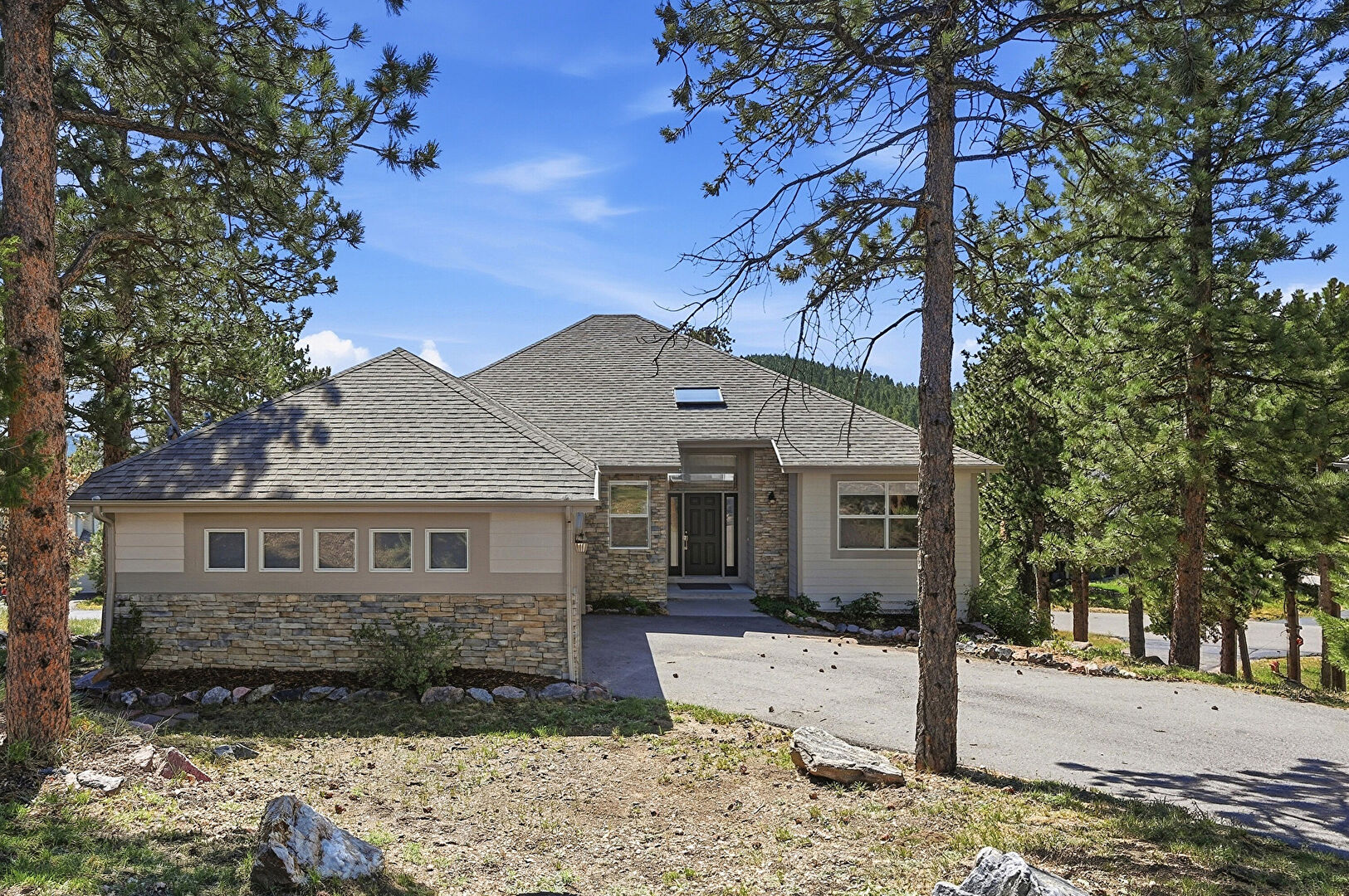 Front at 31042 Wildwoods, Evergreen, CO 80439, listed by Kimberly Burns