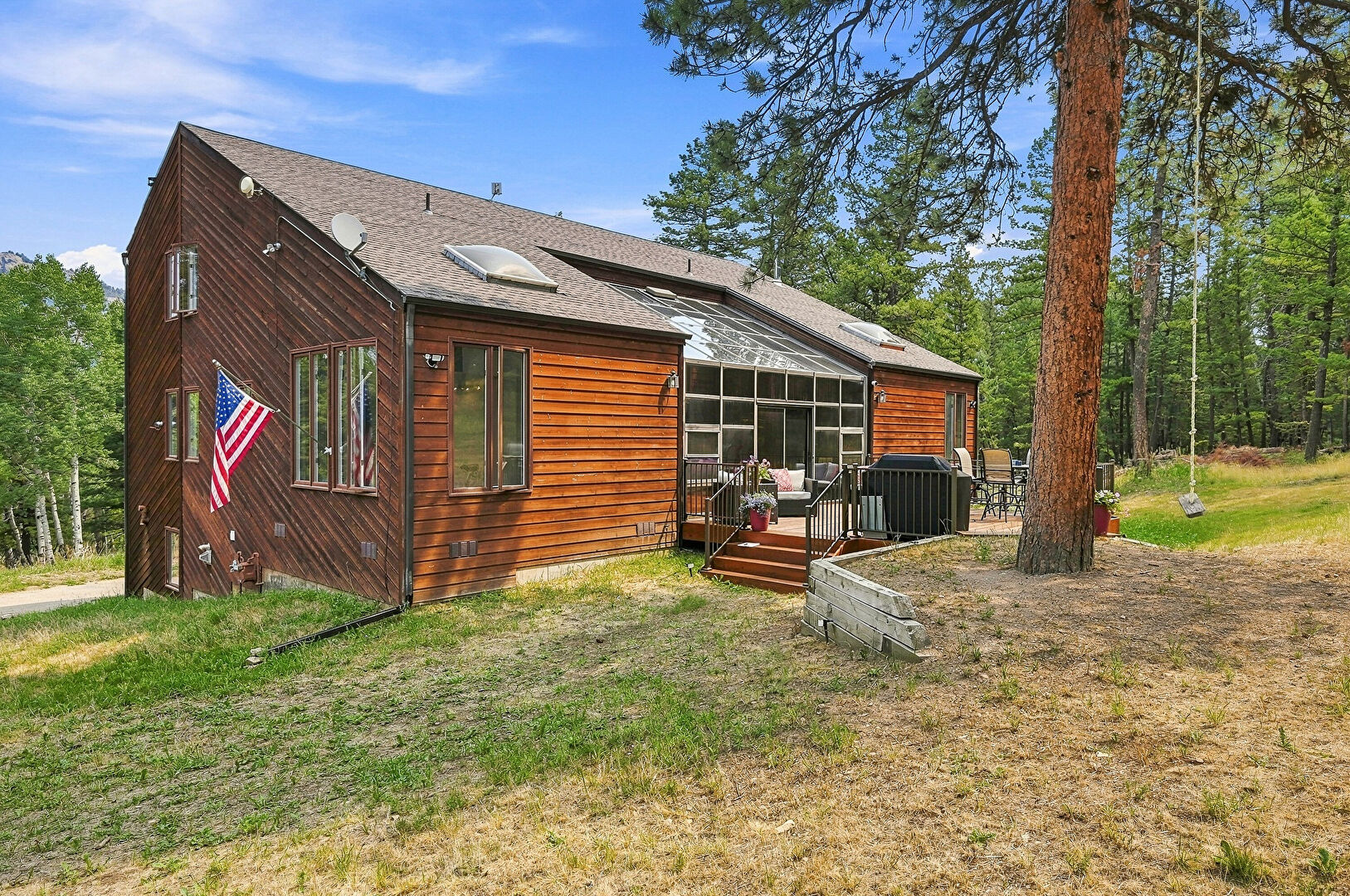 Front at 25457 Snyder Avenue, Aspen Park, CO 80433, listed by The Dolph Team