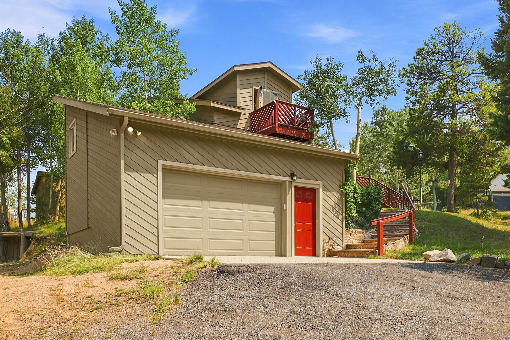 Front at 9228 Black Mountain Drive, Conifer, CO 80433, listed by Jacqueline Neal