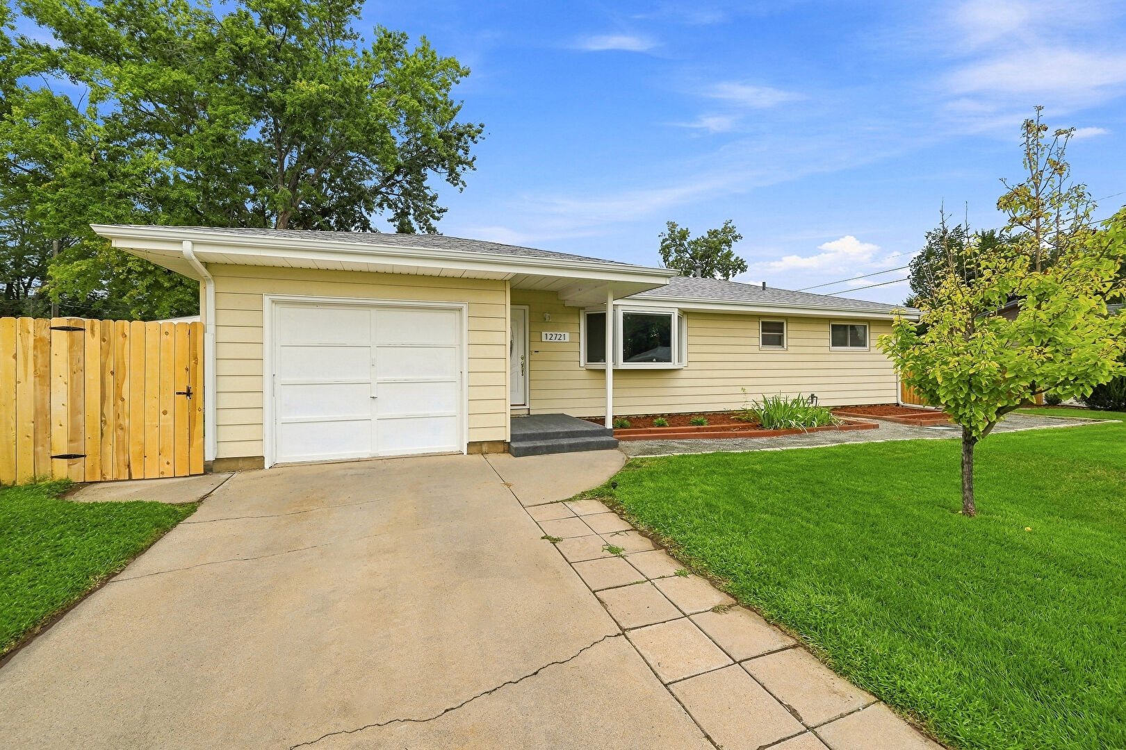Front at 12721 Woodland Drive, Longmont, CO 80504, listed by Paul D. Andrews